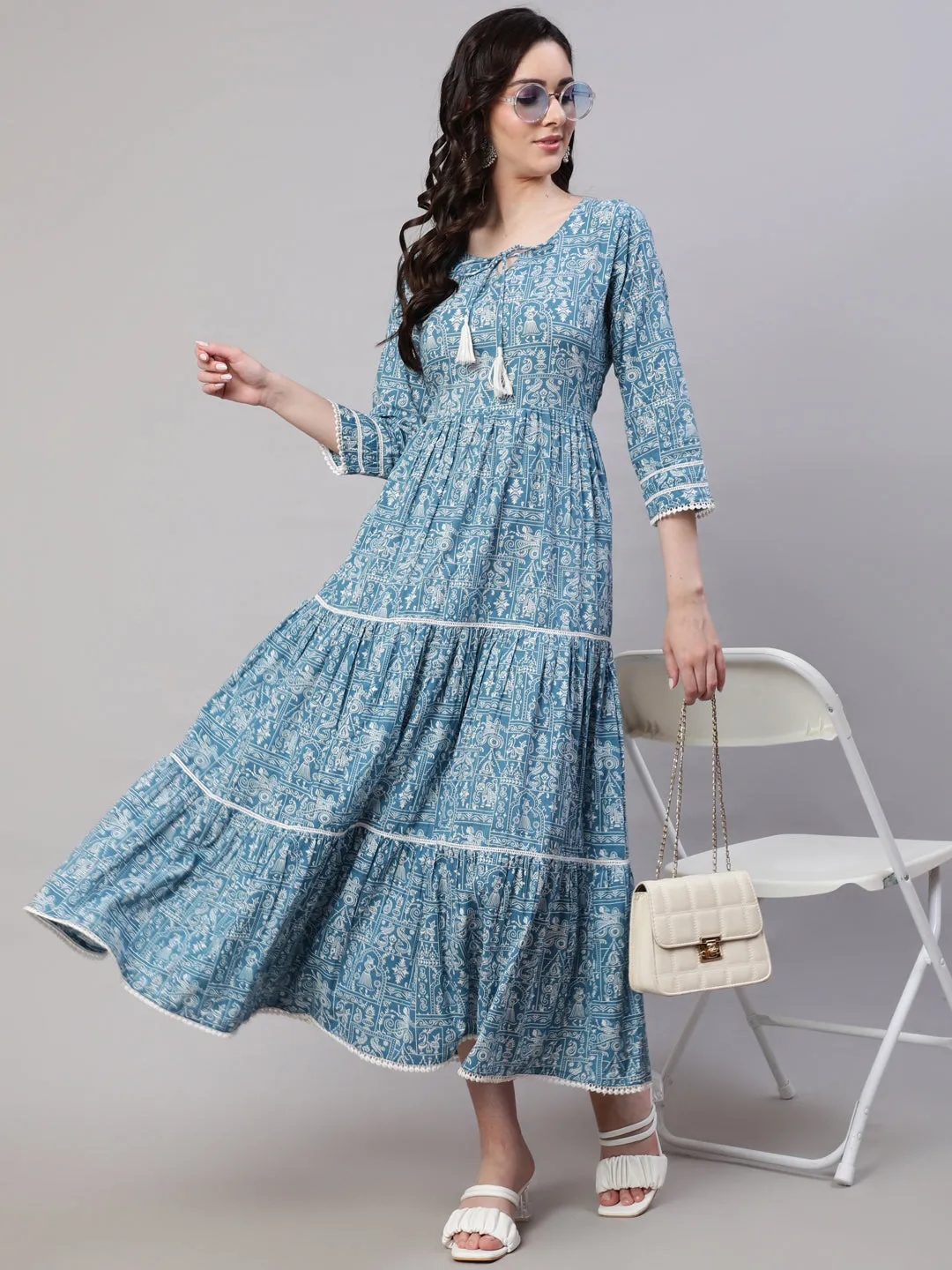 Wome Blue Ethinc Printed Tired Dress With Tie Up Neck