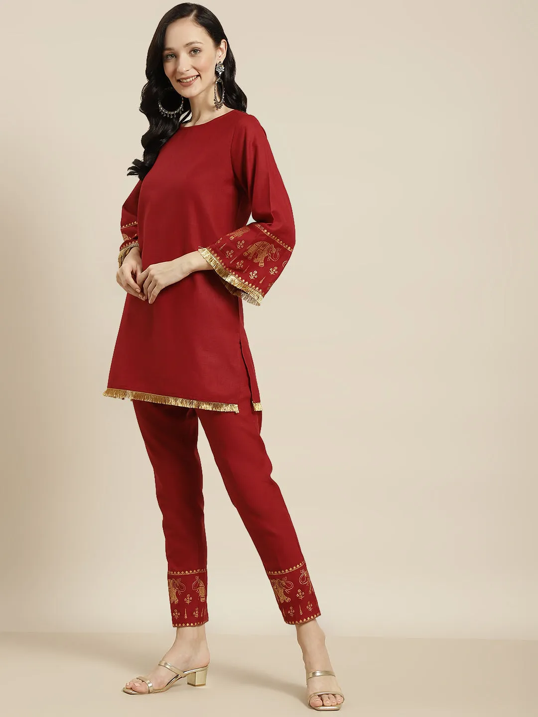 Women Maroon Foil Elephant Border Kurta With Pencil Pants